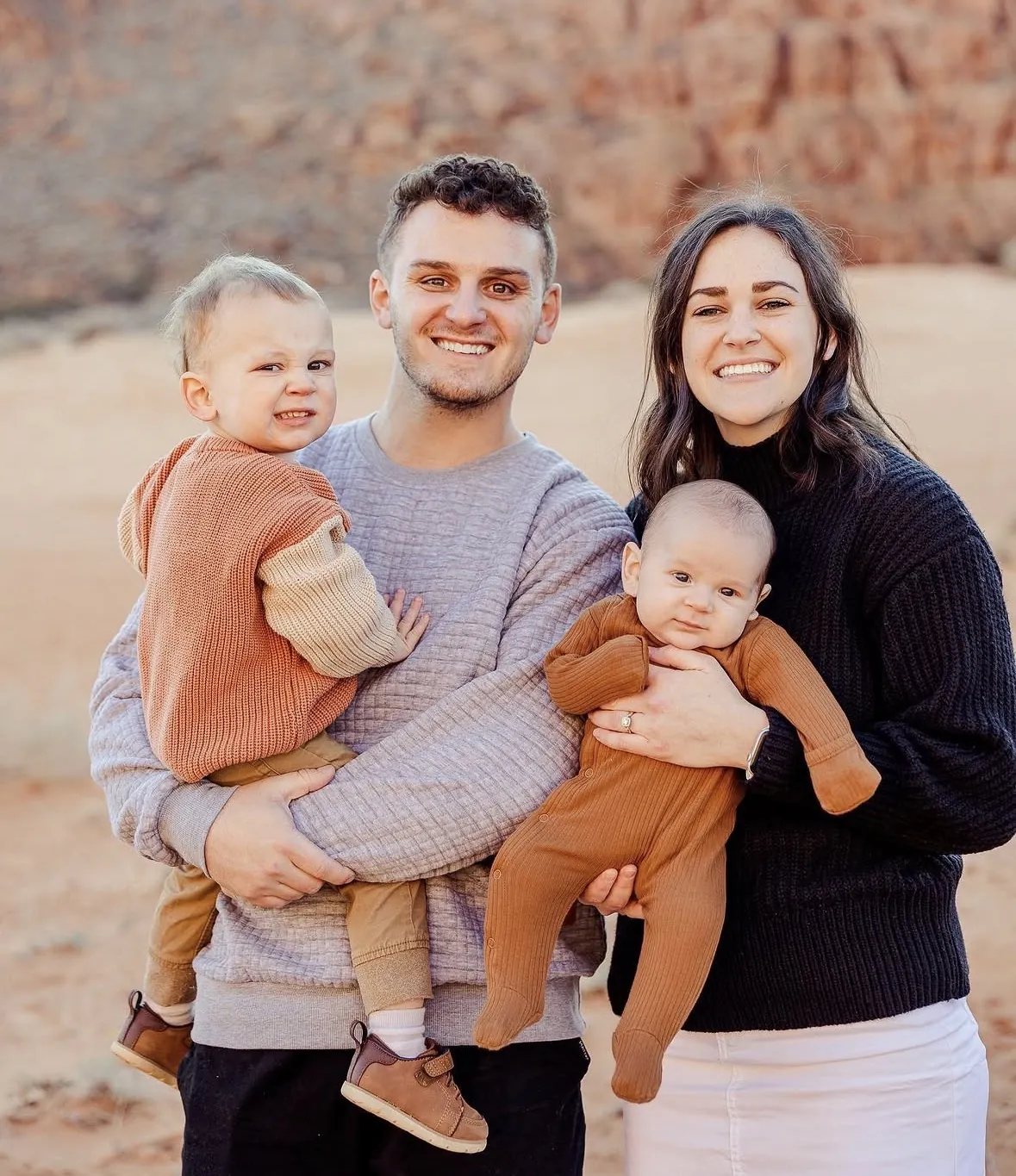Josh Barnes and his family in the red rock